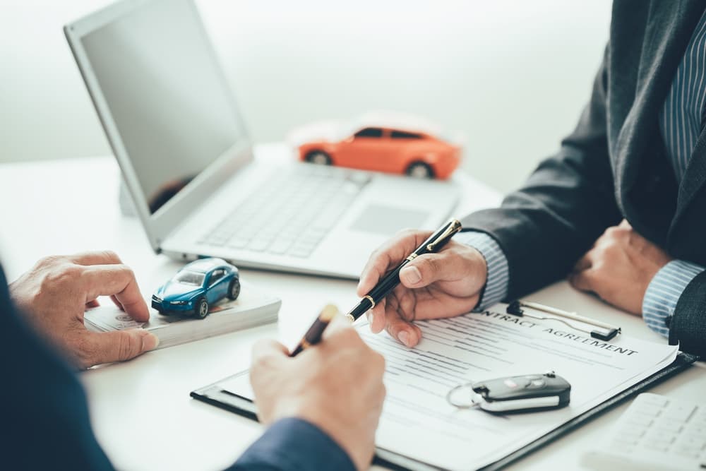 The insurance company offers a quick settlement to its client for a car accident claim.







